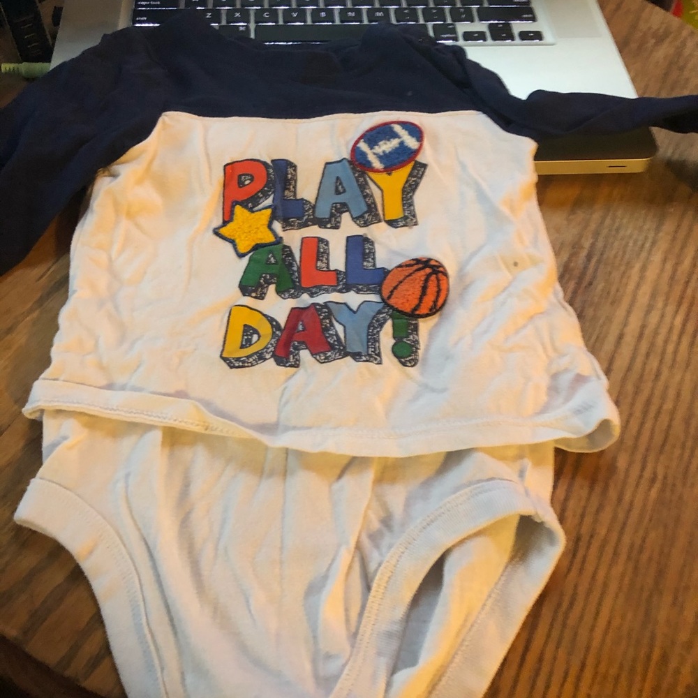 “Play all day” onesie